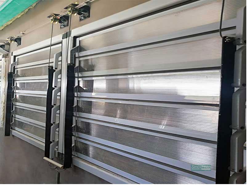 Motorized intake louvers on a facility wall
